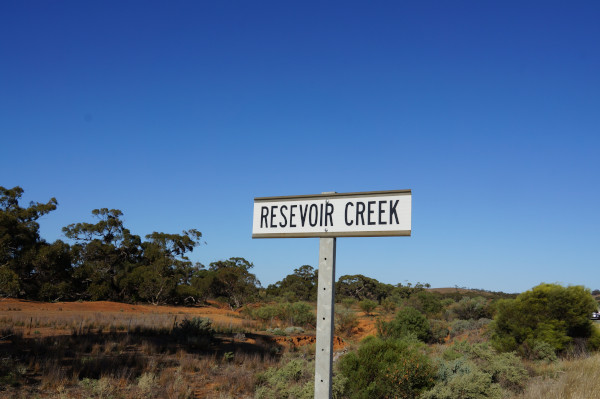 sign spelled RESEVOIR creek